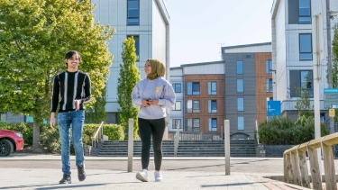 Two Hertfordshire International College walking together on campus