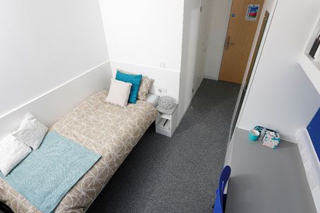 Standard en-suite bedroom with study table