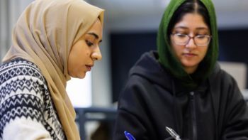 Two Muslim Students Studying